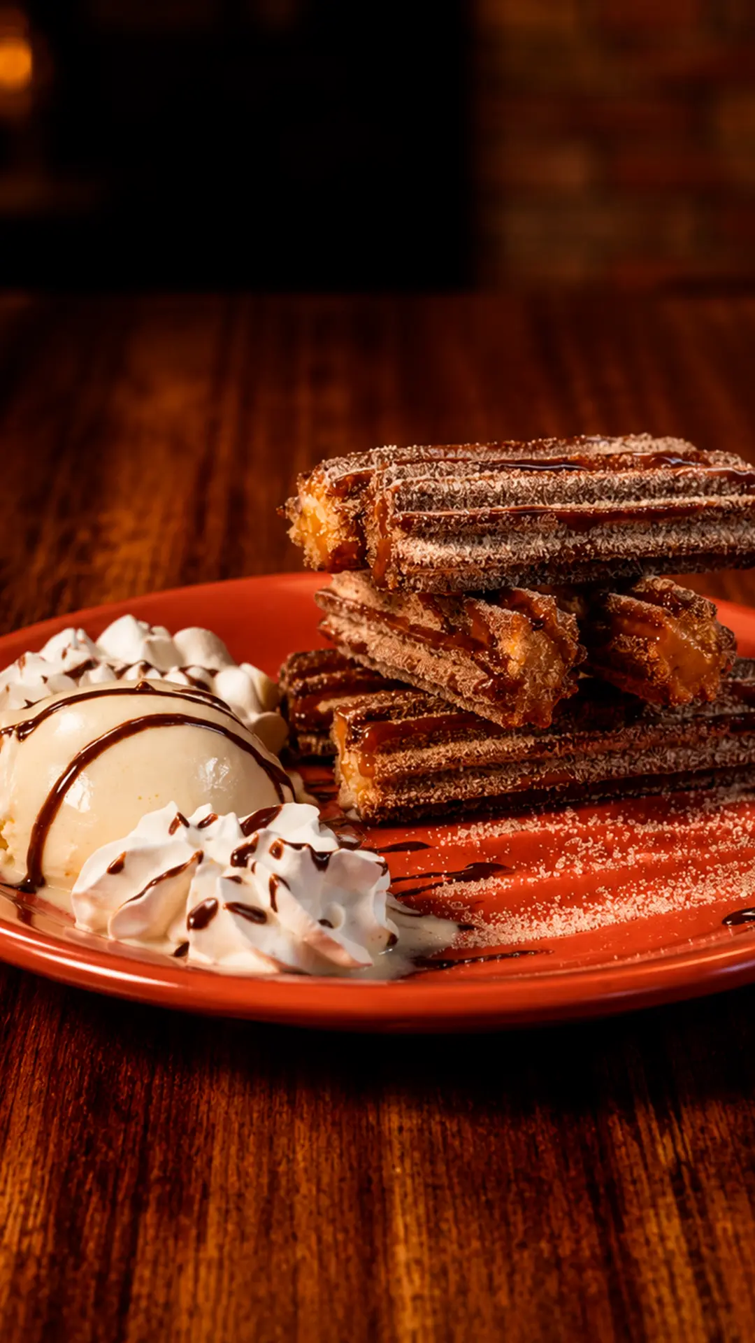 Churros with vanilla ice cream and chocolate
